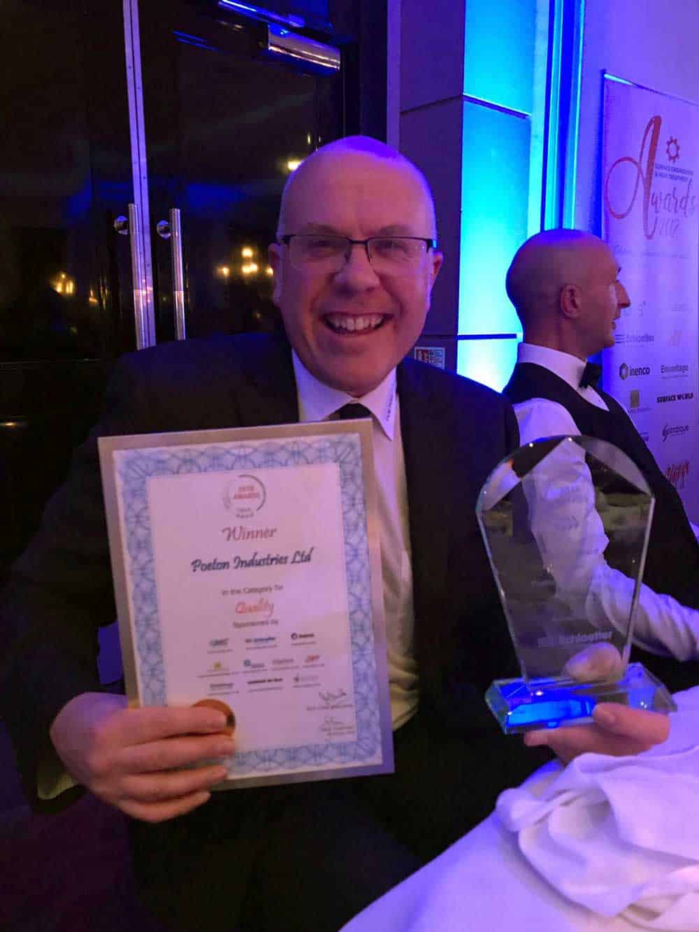 Andy-Haywood-Poeton-Group-Qulaity Group Quality Assurance manager with quality award and certificate at SEA Award