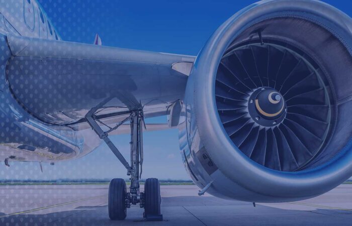 Aeroplace-Wings-Engine-933100994-1950W Large engine on a wing of an aircraft
